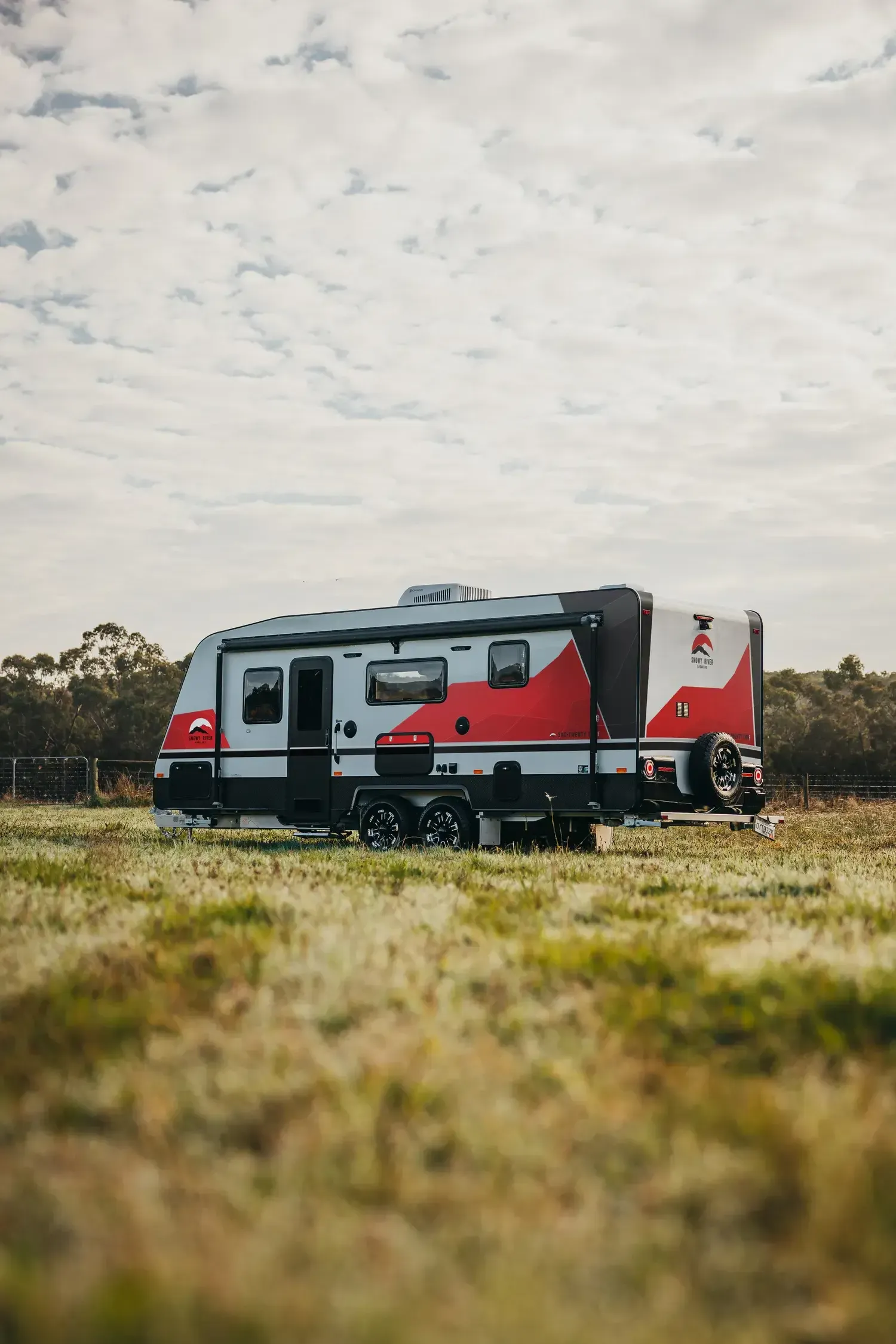 Touring caravan exterior parked on grass