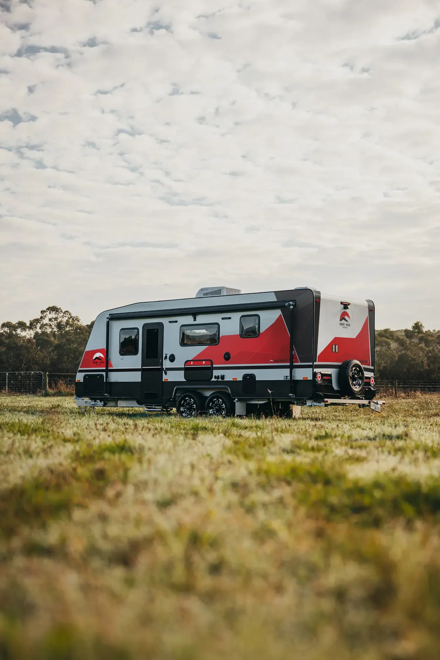Touring caravan exterior parked on grass
